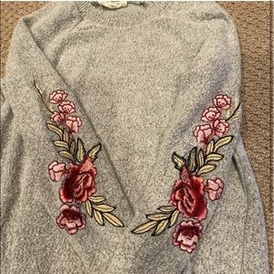 gray sweater with floral embroidery